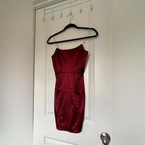 Satin maroon mini dress. Small pulling on dress. Can’t see when on.